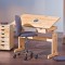 Set birou ergonomic pentru copii HM Julia, inaltime reglabila, unghi inclinare ajustabil, lemn si dulapior HM Nils, roti, sertare, natur