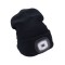EXTOL LIGHT caciula, neagra, tricotata, cu lanterna frontala LED deta?abila, 4?45 Lumen; Li-ion reincarcabila USB, 3 func?ii (100%-75%-50% luminozitat