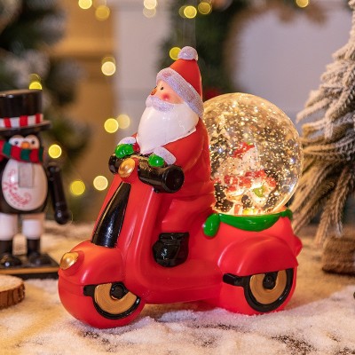 Decoratiune craciun, tip motocicleta, glob 10 cm, figurine mos craciun, 3 moduri, functie muzicala, zapada in miscare, functioneaza cu baterii ( 3 x a foto
