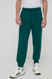 Cumpara ieftin Adidas Performance Pantaloni de bumbac bărbați, culoarea verde, material neted