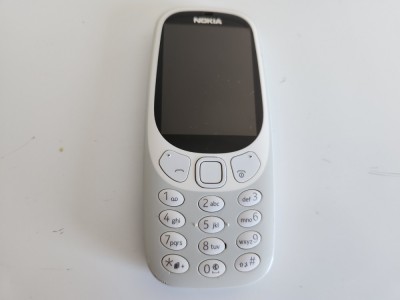 Telefon Nokia 3310 folosit gri nu incarca pentru piese foto