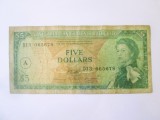 Rară! Eastern Caribbean States(Statele din Caraibele de Est):Antigua 5 Dollars 1983 cu supratipar litera A,bancnota din imagini la cel mai mic preț