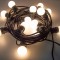 Ghirlanda luminoasa 15 m, 15 becuri led rotunde mate, cablu negru, lumina calda, 3000K