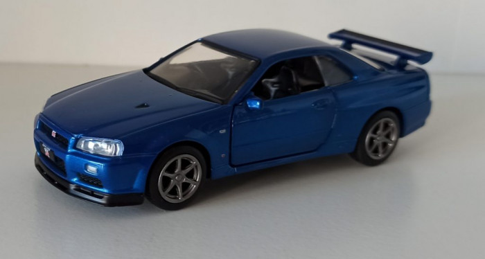 Macheta Nissan Skyline GT-R R34 albastru - Tayumo 1/36