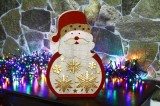 Figurina Craciun om de zapada, Hoff, 5 LED-uri, lumina calda, alimentare baterii, H 30 cm