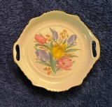 farfurie decorativa unicat fine porcelaine apulum are toarte are marginea aurita este relativ rotunda are un desen floral foarte frumos