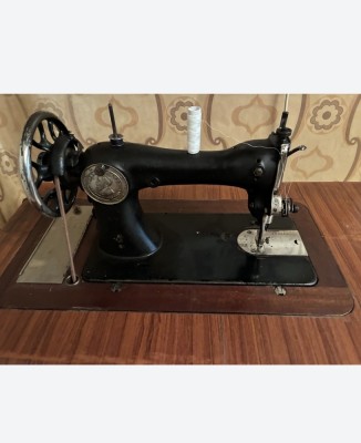 Masina de cusut foto
