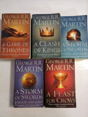 A SONG OF ICE AND FIRE (four volumes): A GAME OF THRONES / A CLASH OF KINGS / A STORM OF SWORDS / A FEAST FOR CROWS (in limba foto