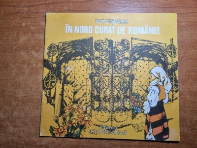 carte pentru copii - in nord curat de romanie - din anul 1988 foto