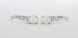 Cercei eleganti din Argint cu Opal Alb Oval si Zirconiu Stralucire si Rafinament