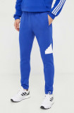 Adidas pantaloni de trening cu imprimeu IR9178