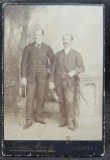 Fotografie pe carton, doi barbati cu mustata, inceput de secol XX