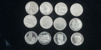M2 - 12 monede de 50 bani omagiale diferite emise in perioada 2010 - 2019 foto