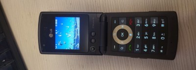 Telefon Rar Clapeta LG HB620T Black Livrare gratuita! foto