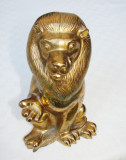 Pusculita veche din antimoniu aurit in forma unui leu, Statuete