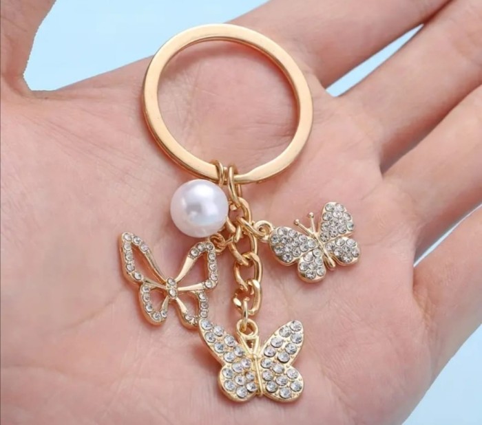 Breloc fluturi din aliaj cu pietricele si perla, auriu, un inel, 3*7 cm