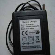 Adaptor/incarcator Battery charger model XR-DC060300, iesire 6V, 300mA