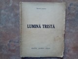 LUMINA TRISTA - VERSURI de TRAIAN LALESCU