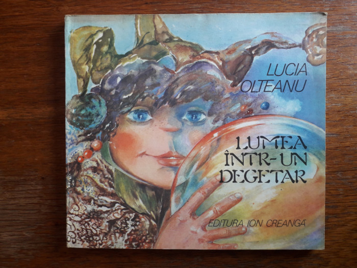 Lumea intr-un degetar - Lucia Olteanu / R6P3F