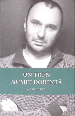 UN TREN NUMIT DORINTA. POEM-MARIUS TUCA-278276 foto