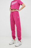 Reebok pantaloni de trening culoarea roz, neted