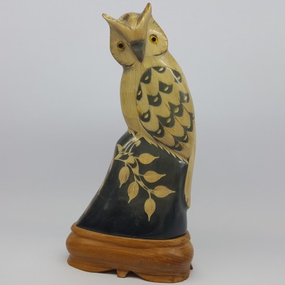 Bufnita din corn suport lemn foto