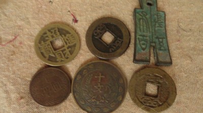 aMONEDE CHINA VECHE foto