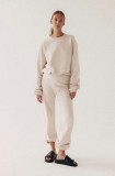MUUV. pantaloni de trening culoarea bej, neted