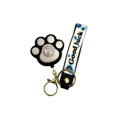 Jucărie mini lăbuță cu luminițe colorate, tip breloc, neagră, 7 cm