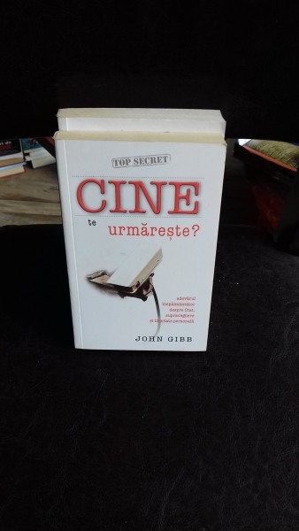 CINE TE URMARESTE? - JOHN GIBB