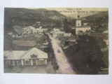 Carte postala Targu Ocna:Biserica Sf.Nicolae si piata orasului,circulata.anii 20, Printata