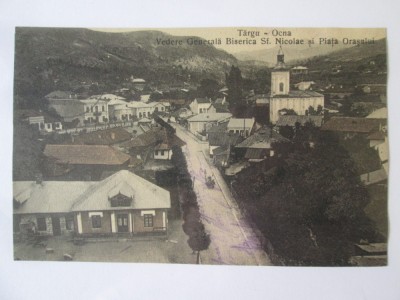Carte postala Targu Ocna:Biserica Sf.Nicolae si piata orasului,circulata.anii 20 foto
