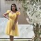 Rochie galbena scurta cu flori aplicate pe umar