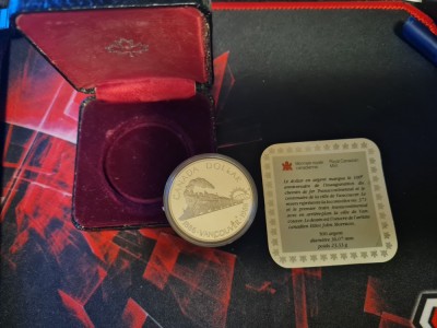 1 dolar canadian sin argint foto