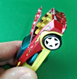 510 Majorette Fiction Diecast scara 1:64 carcasa metalica roșie, plastic galben și parbriz albastru, capotă decupată și rabatabilă. Vintage X