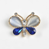 Brosa fluture cu pietre albastre