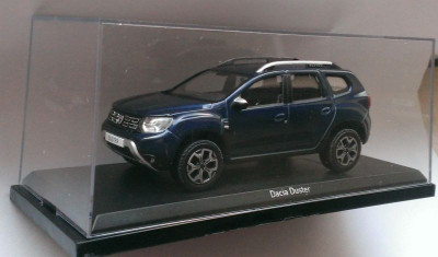 Macheta Dacia Duster 2 2018 cosmo blue - Norev 1/43 foto