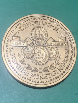 Medalie centenarul sistemului monetar național foto