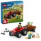 Tractor de ferma rosu cu remorca si oi