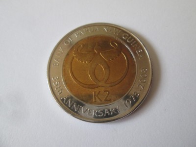 Papua Noua Guinee 2 Kina 2008 UNC moneda aniversara:35 de ani de la infiintarea bancii nationale,diametrul=33 mm,greutate=12,10 grame foto