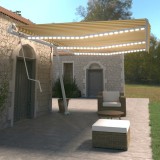 vidaXL Copertină automată cu senzor v&acirc;nt &amp; LED, galben/alb, 600x350 cm
