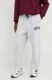 Tommy Jeans pantaloni de trening culoarea gri, melanj, DM0DM19802