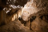 Tablou Canvas, "Forme misterioase &icirc;n ad&acirc;ncurile peșterii", Stalactite, Stalagmite, Lumină, Peșteră, Forme, Natură, Umbre, Rocă, Texturi, Mister., 39 x
