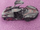 Masinuta/macheta metalica vintage,macheta auto vintage metalica Masina din metal Ferrari, cu usi care se deschid si faruri care se aprind intermitent, Revell