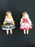 Doua papusi vintage din cauciuc imbracate in costume populare de colectie ideale pentru colectionari