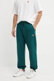 The North Face pantaloni de trening din bumbac Axys barbati, culoarea verde, neted, NF0A8C1U6GI1