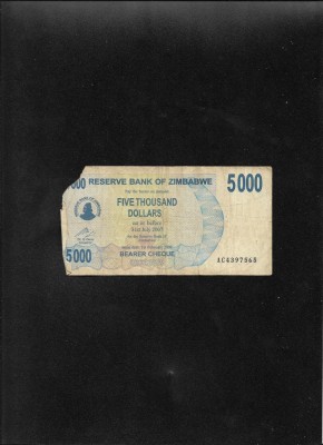 Zimbabwe 5000 dollari dollars 2007 seria4397565 uzata colt lipsa foto