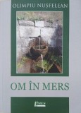 Om in mers - Olimpiu Nusfelean