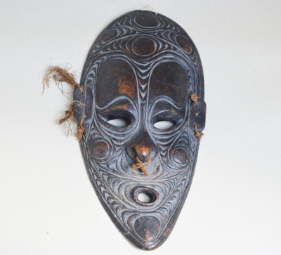 Veche masca de lemn Papua Noua Guinee foto