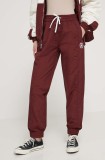 Cumpara ieftin Converse pantaloni de trening culoarea bordo, neted